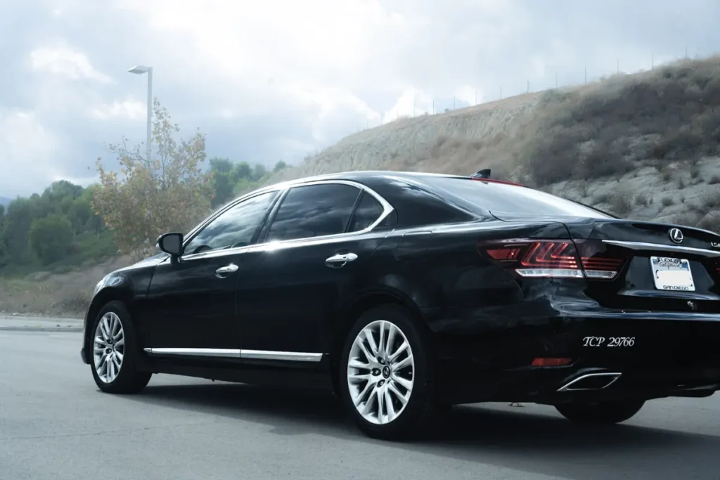 Black luxury sedan for private car service in Irvine CA