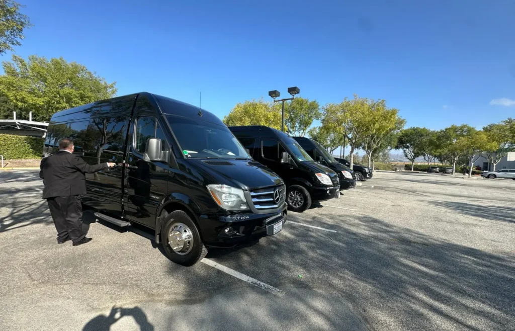 Black Sprinter vans with chauffeur for Irvine wedding and event transportation